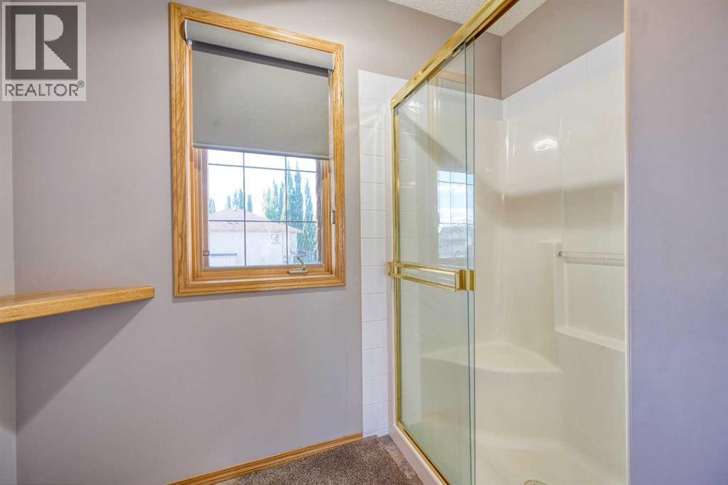 19 Westpoint Court Sw, Calgary, Alberta  T3H 4M7 - Photo 24 - A2259231