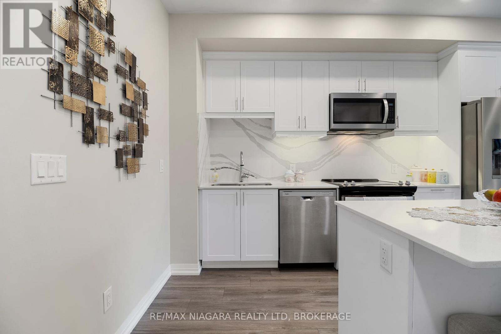 130 - 50 Herrick Avenue, St. Catharines, Ontario  L2P 0G3 - Photo 4 - X12429135