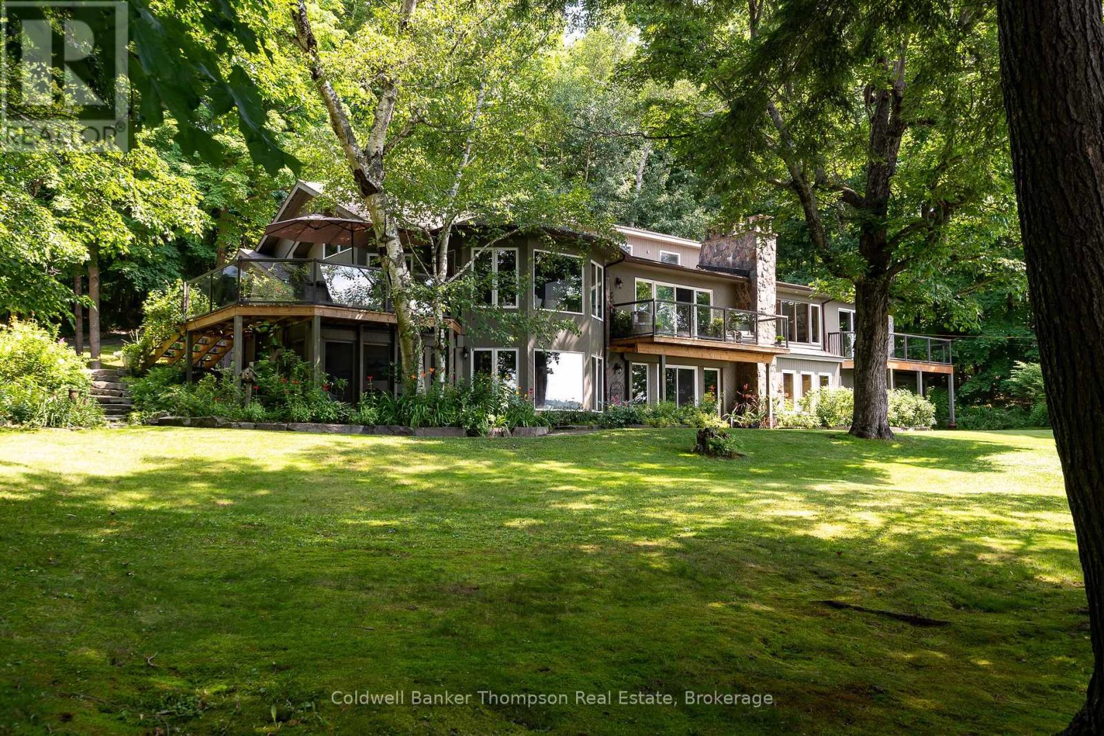 54 Rowan Drive, Huntsville, Ontario  P1H 2J2 - Photo 38 - X12429261
