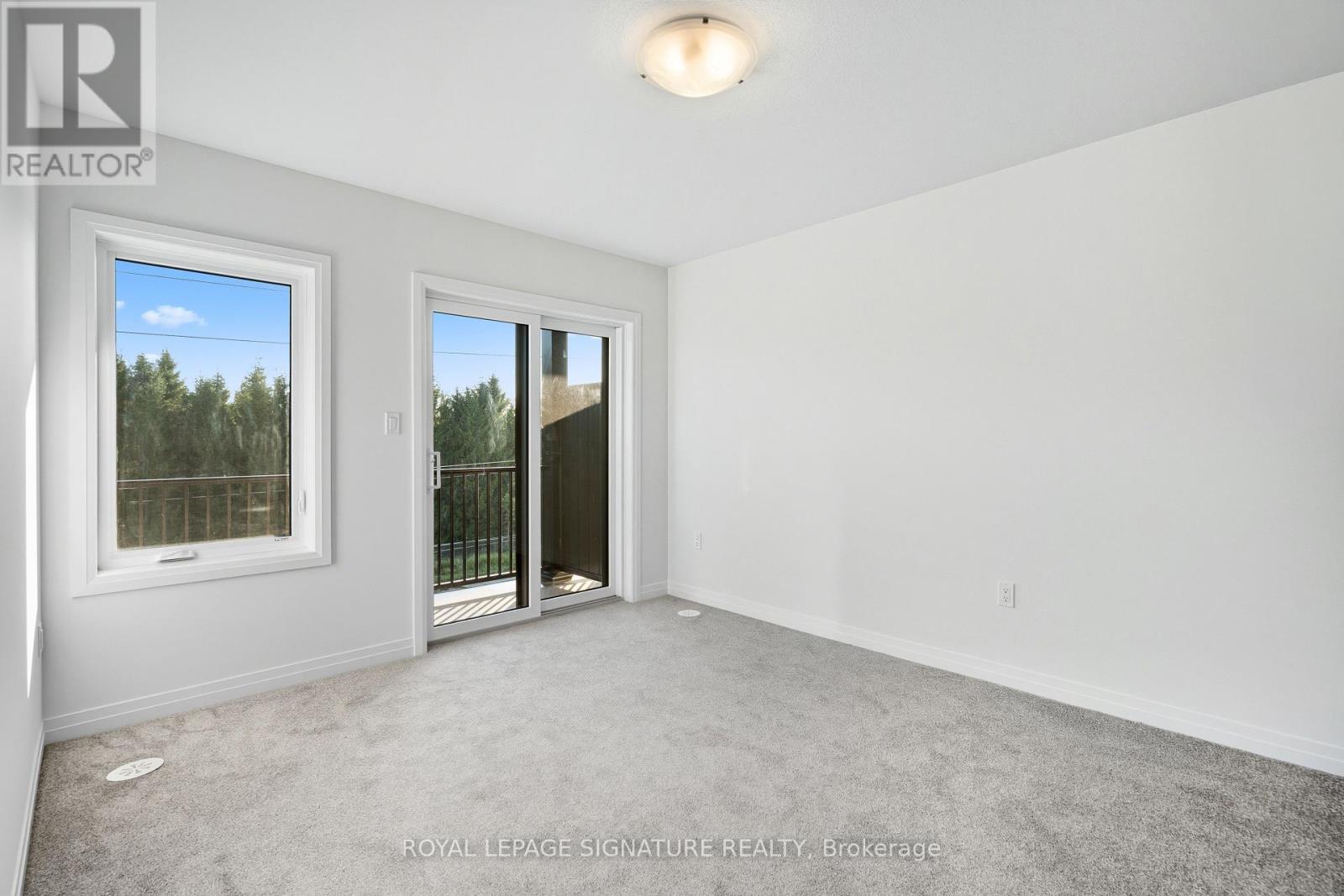 56 - 56 Thatcher Drive E, Guelph, Ontario  N1L 1B3 - Photo 4 - X12429074