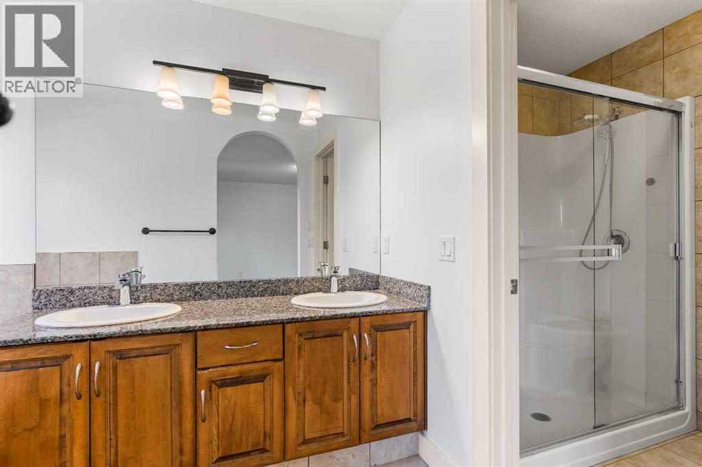 68 Elmont Court Sw, Calgary, Alberta  T3H 5Z8 - Photo 27 - A2246175