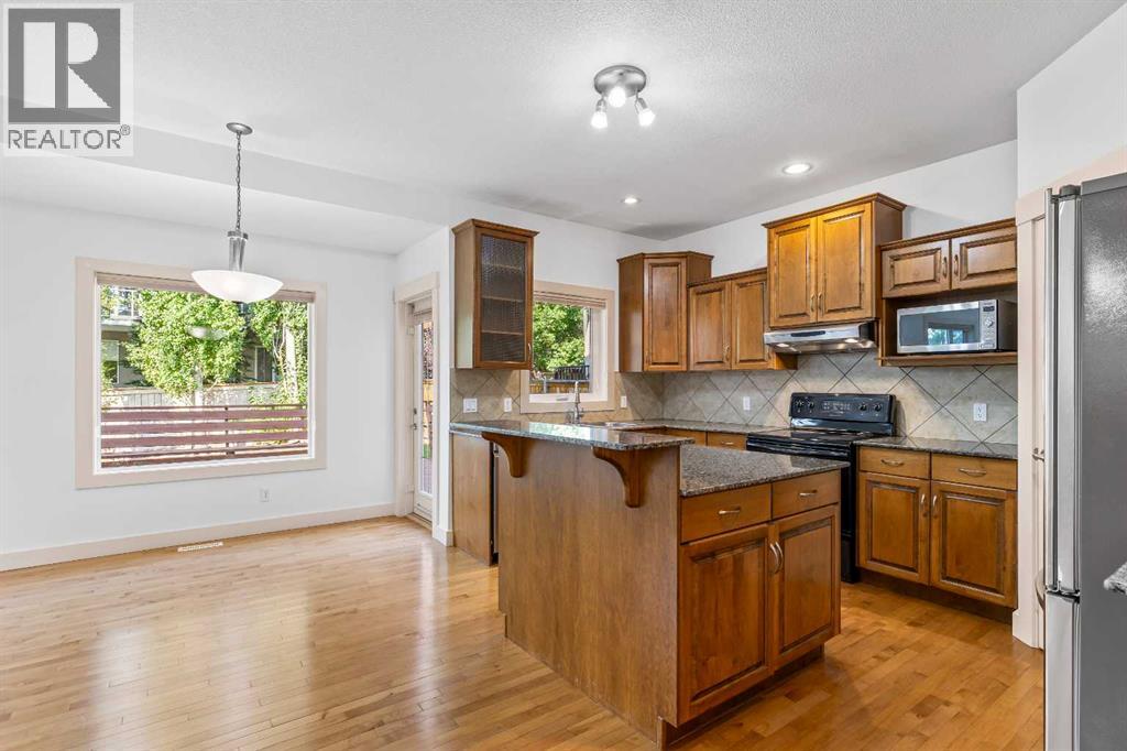 68 Elmont Court Sw, Calgary, Alberta  T3H 5Z8 - Photo 9 - A2246175