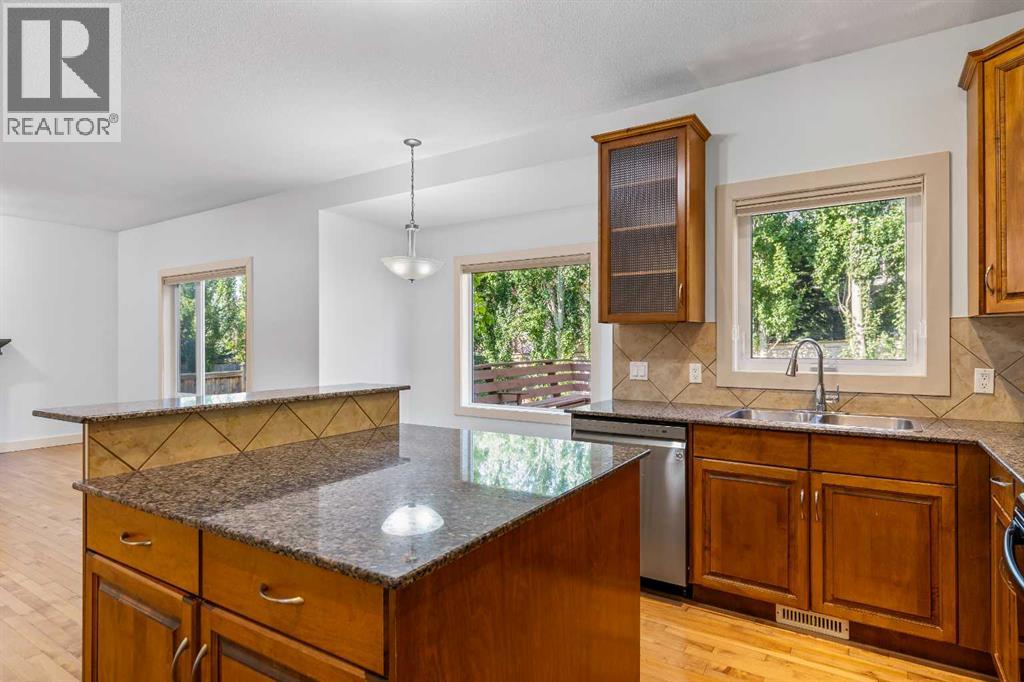 68 Elmont Court Sw, Calgary, Alberta  T3H 5Z8 - Photo 12 - A2246175