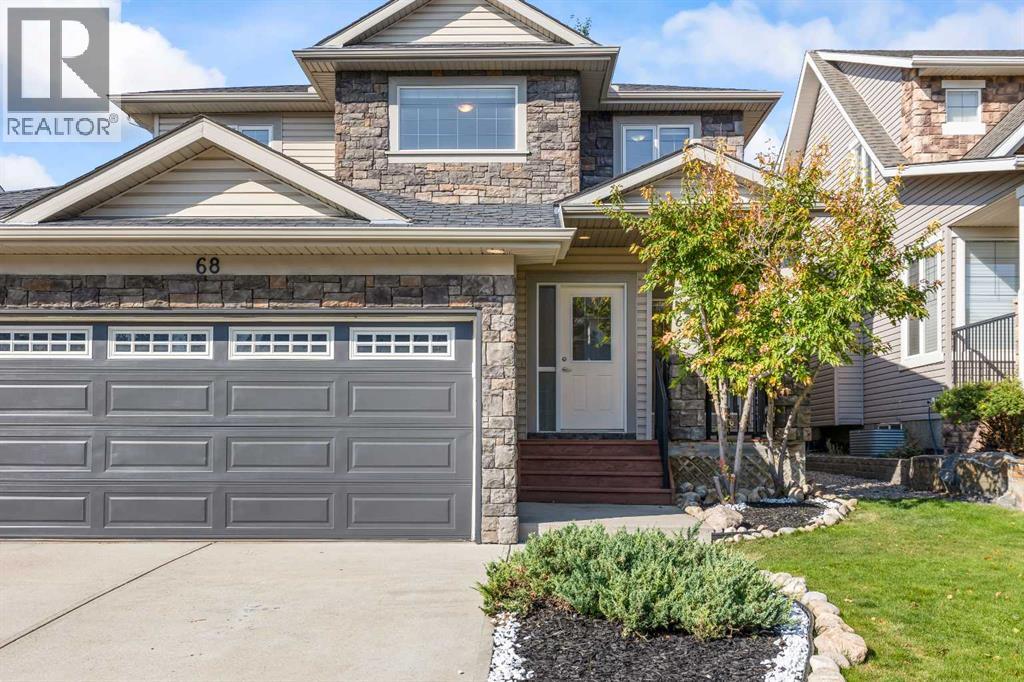 68 Elmont Court Sw, Calgary, Alberta  T3H 5Z8 - Photo 2 - A2246175