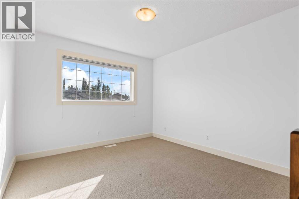68 Elmont Court Sw, Calgary, Alberta  T3H 5Z8 - Photo 22 - A2246175