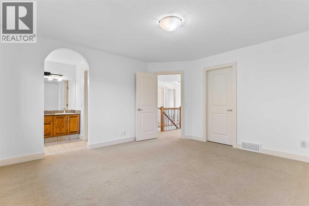 68 Elmont Court Sw, Calgary, Alberta  T3H 5Z8 - Photo 25 - A2246175