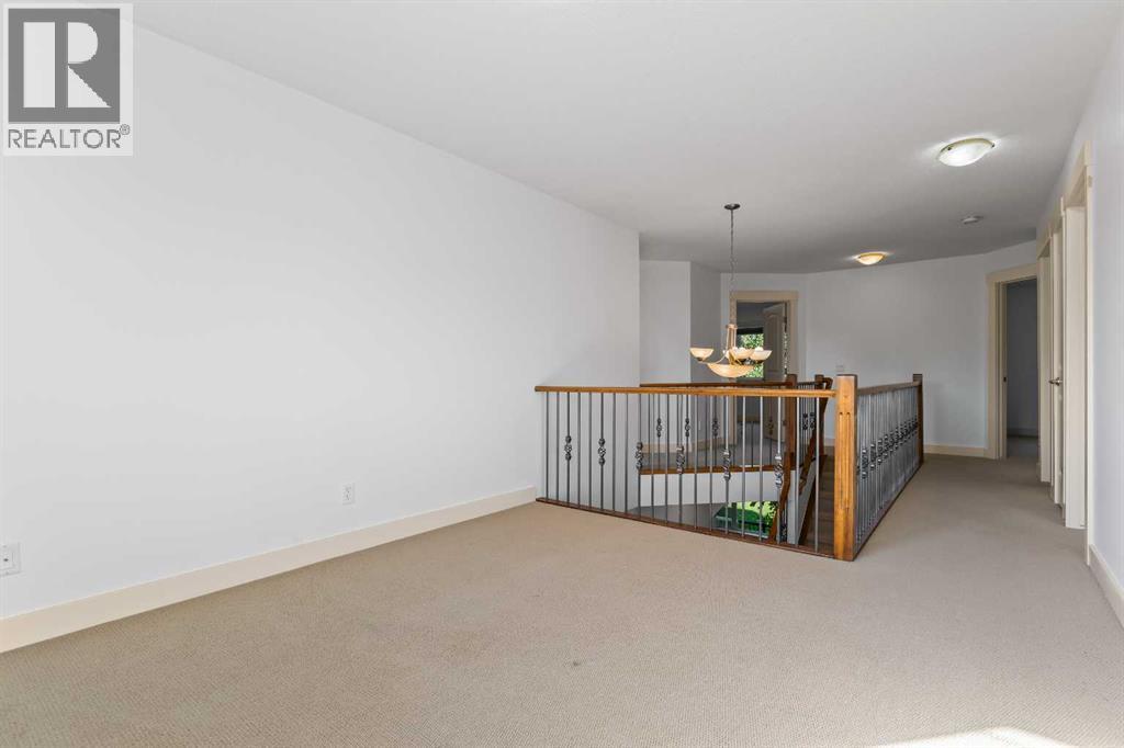 68 Elmont Court Sw, Calgary, Alberta  T3H 5Z8 - Photo 23 - A2246175