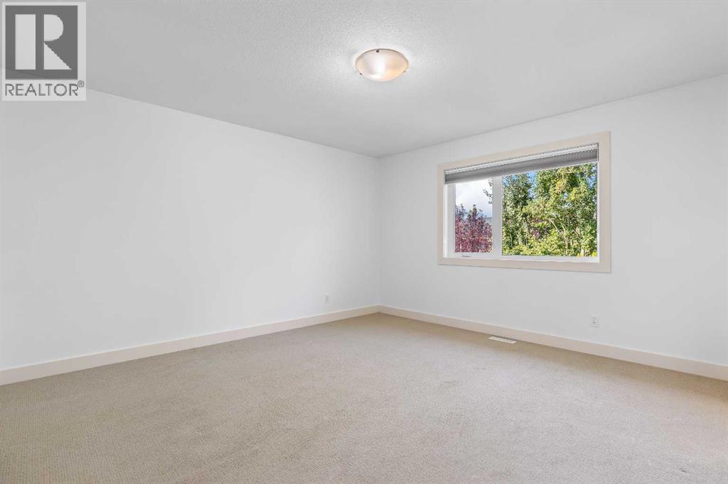 68 Elmont Court Sw, Calgary, Alberta  T3H 5Z8 - Photo 24 - A2246175