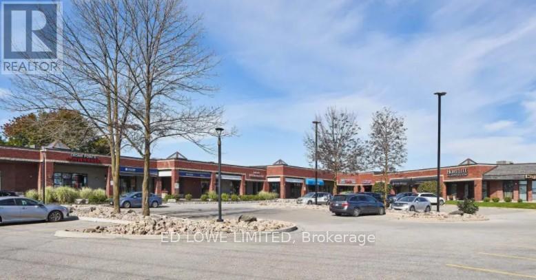 I - 4 Cedar Pointe Drive, Barrie, Ontario  L4N 5R7 - Photo 3 - S12429437