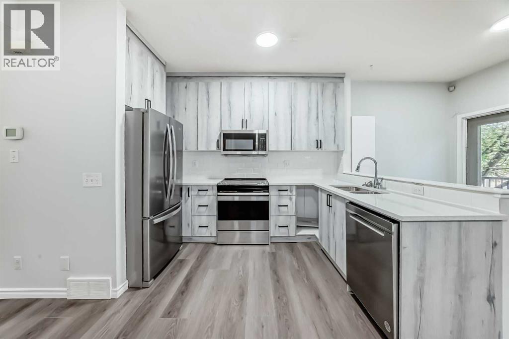 92 Simcoe Place Sw, Calgary, Alberta  T3H 4T8 - Photo 9 - A2260319