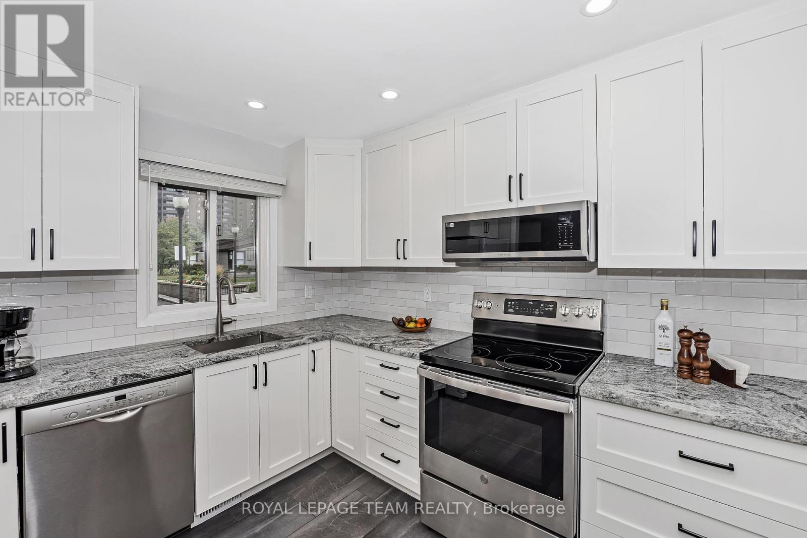 1095 Ambleside Drive, Ottawa, Ontario  K2B 8E2 - Photo 8 - X12429464