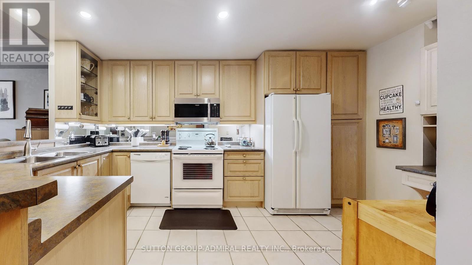 207 - 10 Old Mill Trail, Toronto, Ontario  M8X 2Y9 - Photo 15 - W12419476