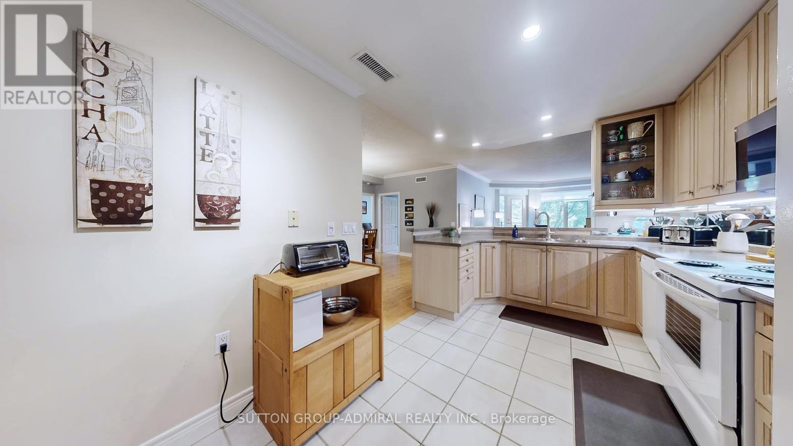 207 - 10 Old Mill Trail, Toronto, Ontario  M8X 2Y9 - Photo 19 - W12419476