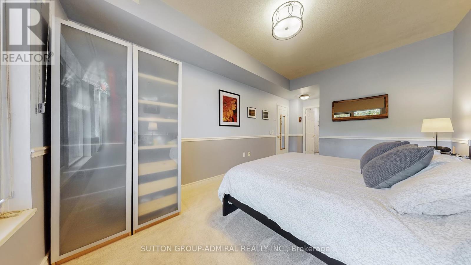 207 - 10 Old Mill Trail, Toronto, Ontario  M8X 2Y9 - Photo 23 - W12419476