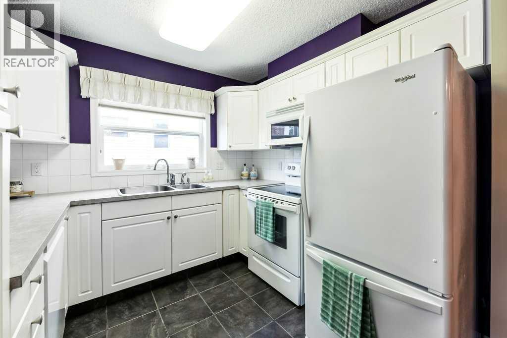 215, 6800 Hunterview Drive Nw, Calgary, Alberta  T2K 6K5 - Photo 9 - A2254564