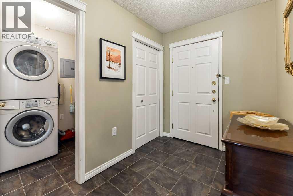 215, 6800 Hunterview Drive Nw, Calgary, Alberta  T2K 6K5 - Photo 4 - A2254564