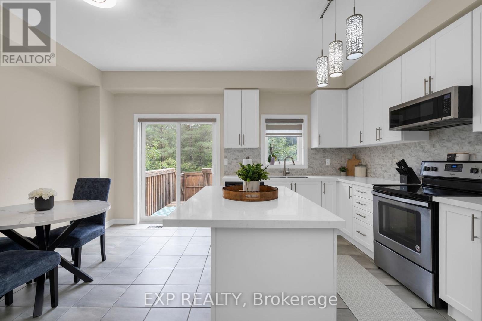 57 Milson Crescent, Essa, Ontario  L3W 0C9 - Photo 5 - N12429659