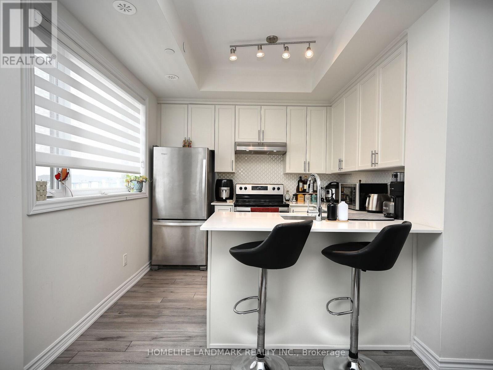 #338 - 349 Wheat Boom Drive, Oakville, Ontario  L6H 7X5 - Photo 11 - W12429724