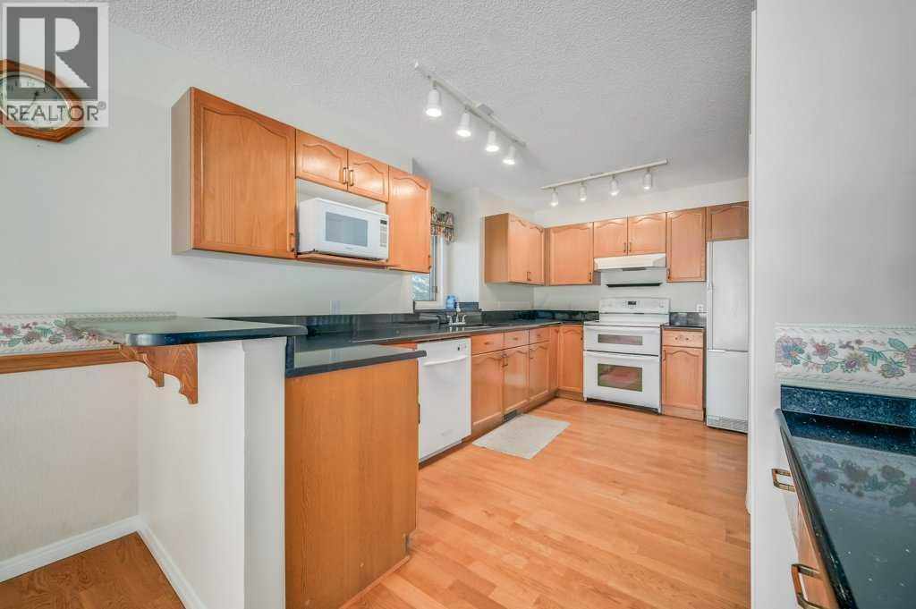 54, 5790 Patina Drive Sw, Calgary, Alberta  T3H 2Y5 - Photo 5 - A2260165