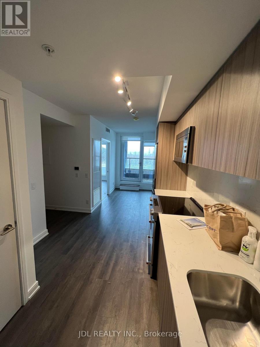 212 - 30 Samuel Wood Way, Toronto, Ontario  M9B 1B1 - Photo 2 - W12429863
