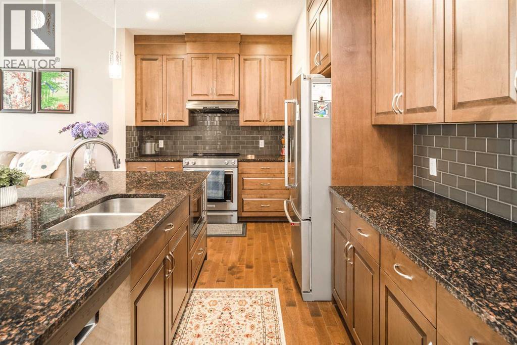 767 Shawnee Drive Sw, Calgary, Alberta  T2Y 1V6 - Photo 4 - A2258396