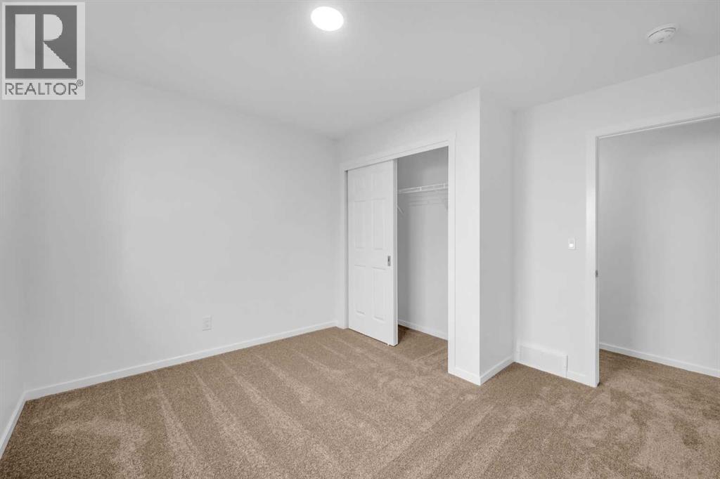 2034 Southwinds Row Sw, Airdrie, Alberta  T4B 5V1 - Photo 28 - A2248310