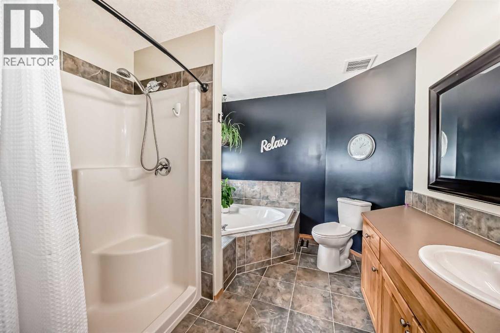 40 Bow Ridge Drive, Cochrane, Alberta  T4C 1V5 - Photo 24 - A2239953