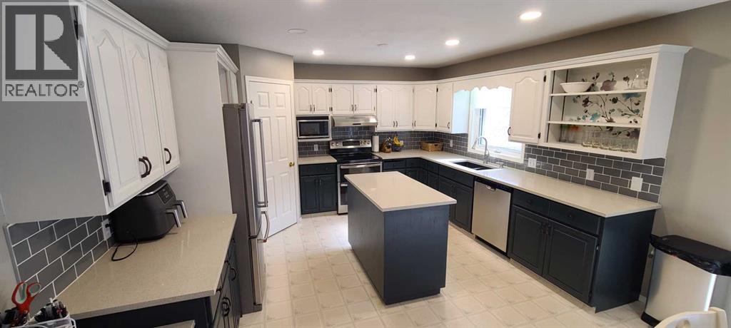337 Ojibwa Place W, Lethbridge, Alberta  T1K 5K7 - Photo 4 - A2259238