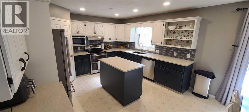 337 Ojibwa Place W, Lethbridge, Alberta  T1K 5K7 - Photo 3 - A2259238
