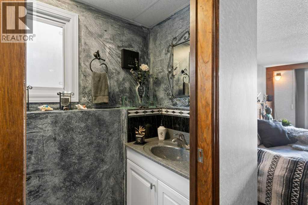 40 Beacham Rise Nw, Calgary, Alberta  T3K 1S2 - Photo 32 - A2235053