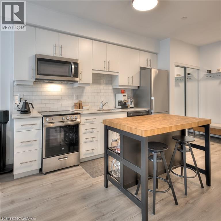 243 Northfield Drive E Unit# 204, Waterloo, Ontario  N2K 0H2 - Photo 1 - 40774127
