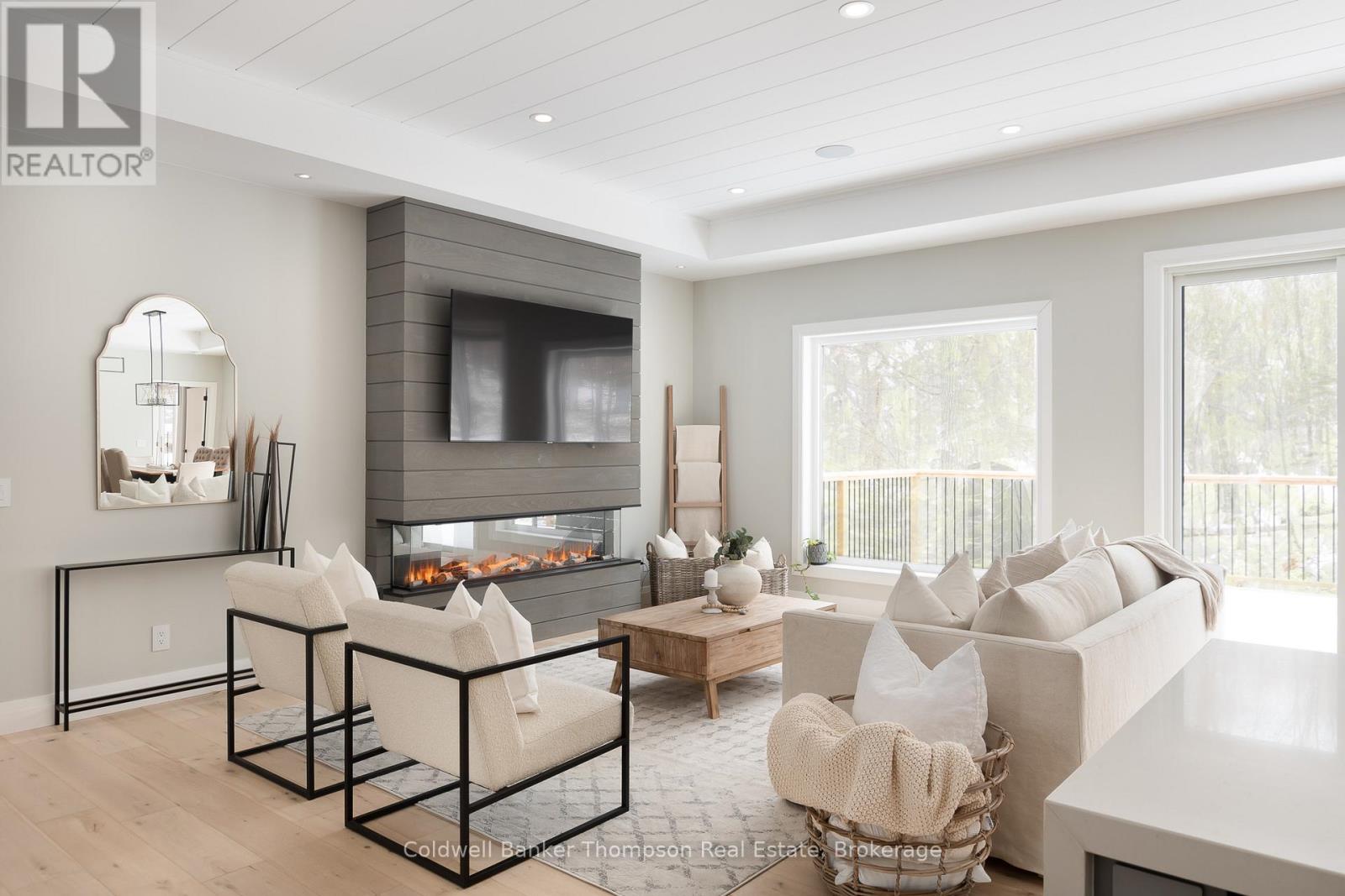 14 Mackenzie Drive, Huntsville, Ontario  P1H 0A1 - Photo 1 - X12367779
