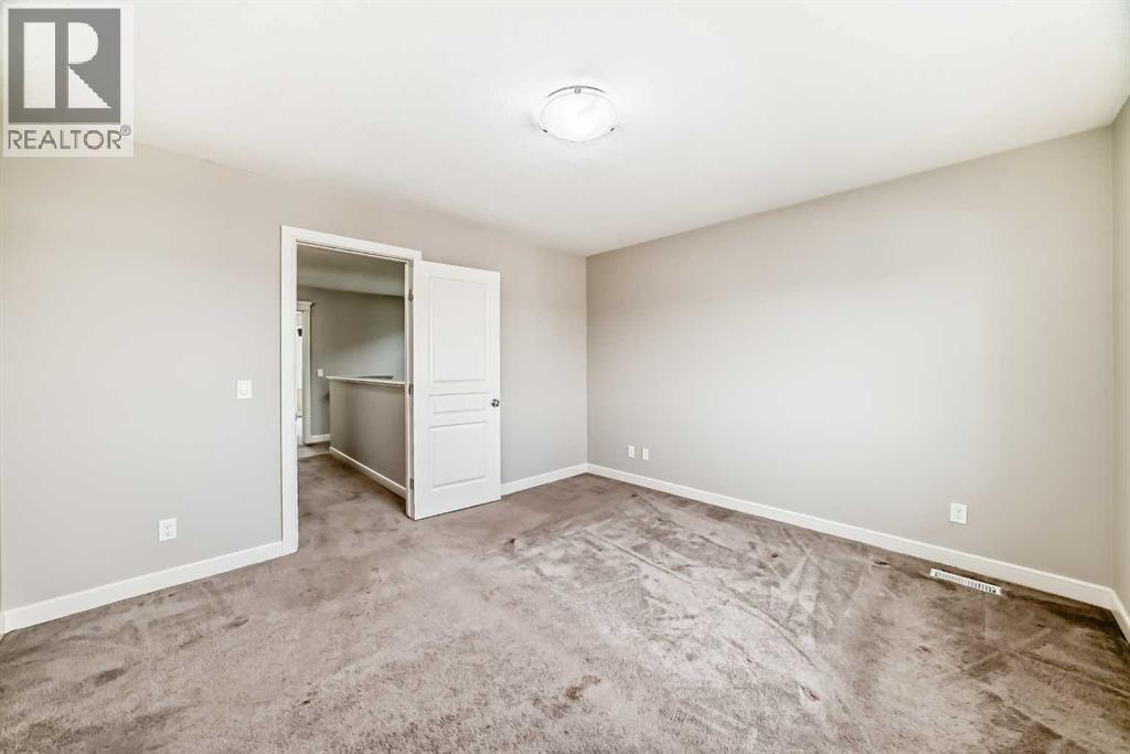 15 Evanscrest Way, Calgary, Alberta  T3P 0R4 - Photo 15 - A2258178