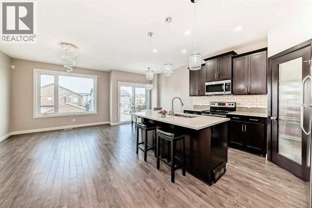 15 Evanscrest Way, Calgary, Alberta  T3P 0R4 - Photo 5 - A2258178