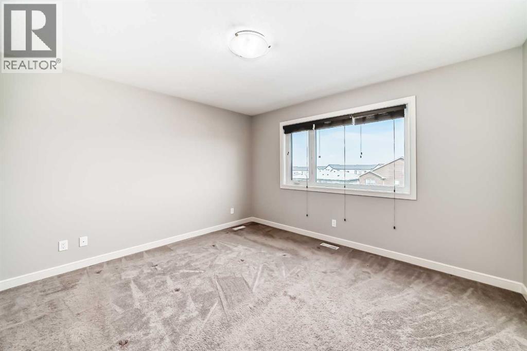15 Evanscrest Way, Calgary, Alberta  T3P 0R4 - Photo 14 - A2258178