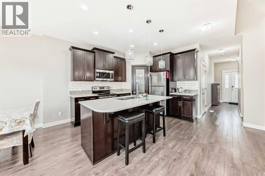 15 Evanscrest Way, Calgary, Alberta  T3P 0R4 - Photo 4 - A2258178