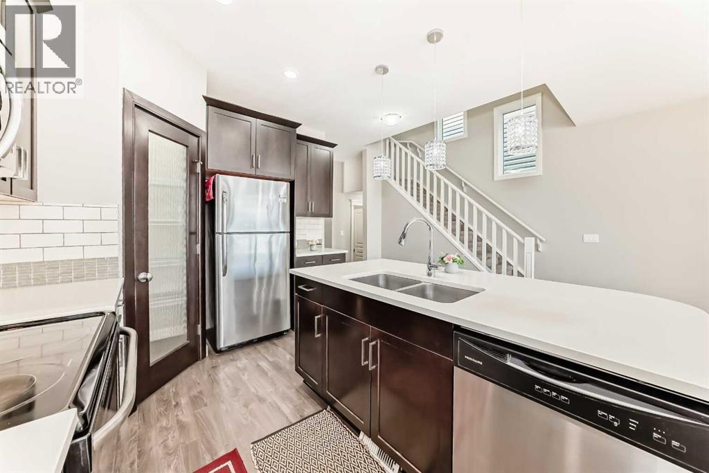 15 Evanscrest Way, Calgary, Alberta  T3P 0R4 - Photo 7 - A2258178
