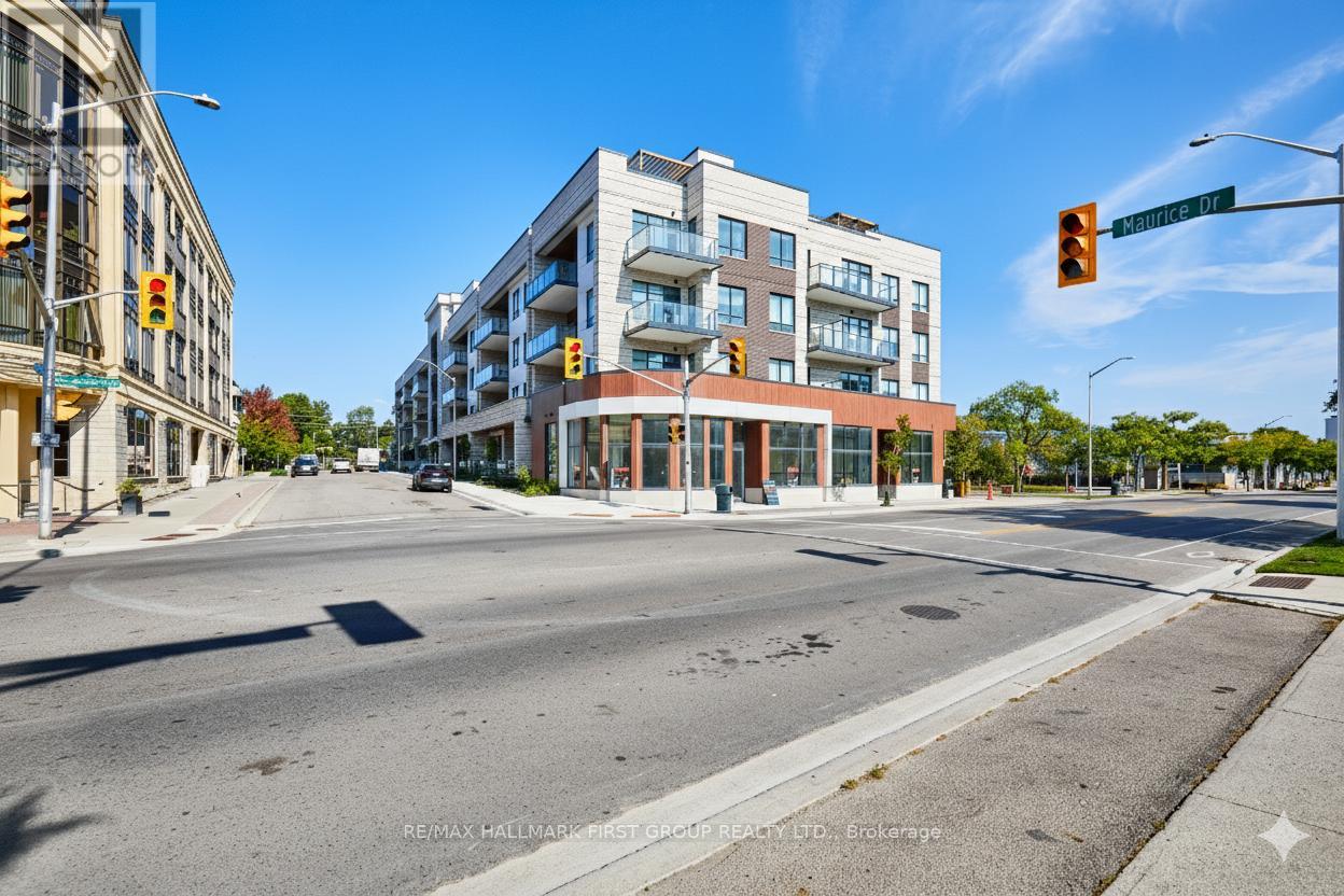 407 - 123 Maurice Drive, Oakville, Ontario  L6K 2W6 - Photo 3 - W12430555