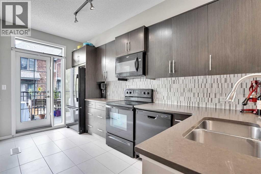 306 Ascot Circle Sw, Calgary, Alberta  T3H 0X2 - Photo 2 - A2254995
