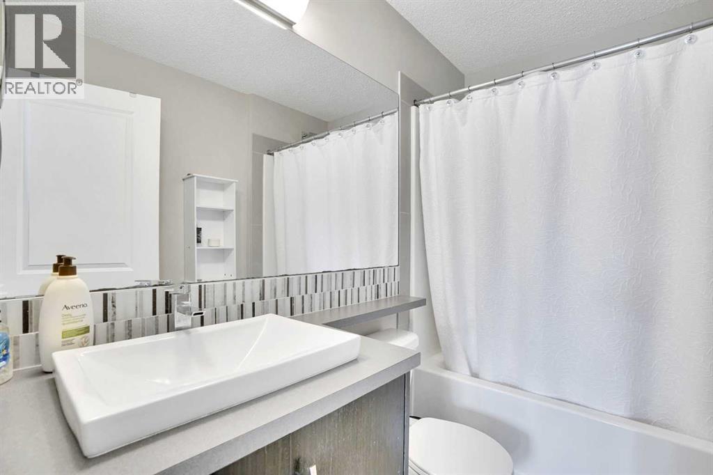 306 Ascot Circle Sw, Calgary, Alberta  T3H 0X2 - Photo 9 - A2254995
