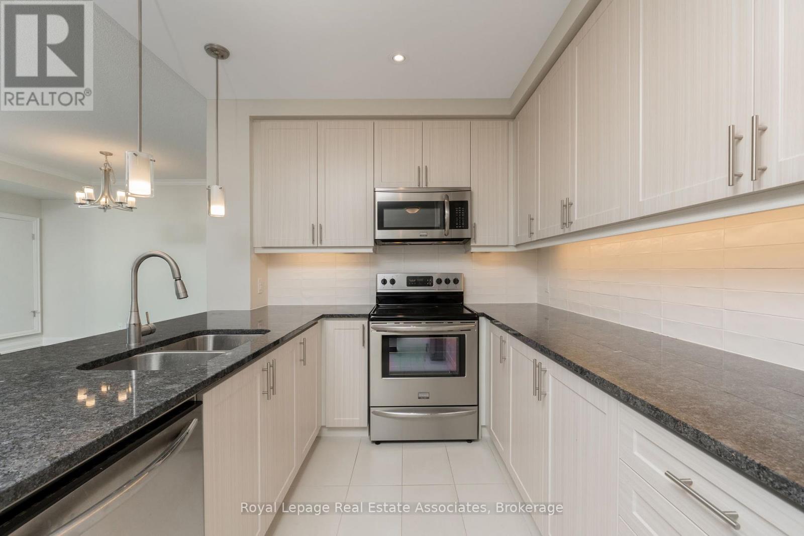 403 - 50 Hall Road, Halton Hills (Georgetown), Ontario  L7G 5G5 - Photo 19 - W12430819