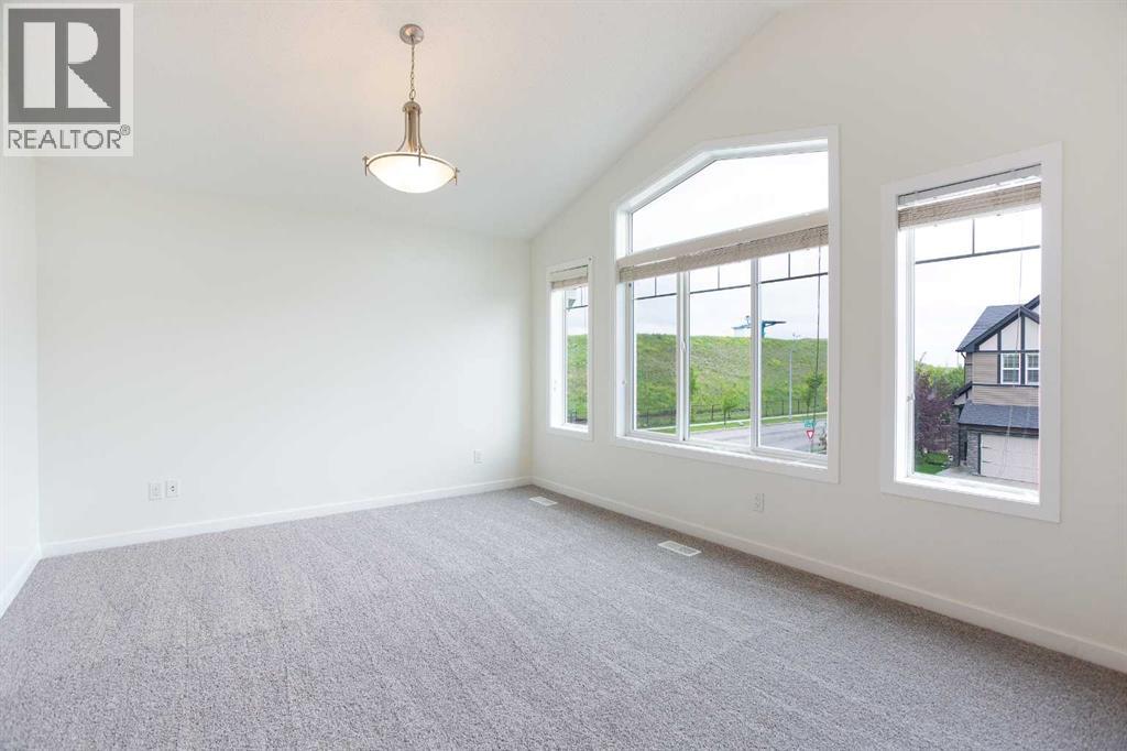 9 Cougar Ridge Rise Sw, Calgary, Alberta  T3H 0S7 - Photo 15 - A2249270