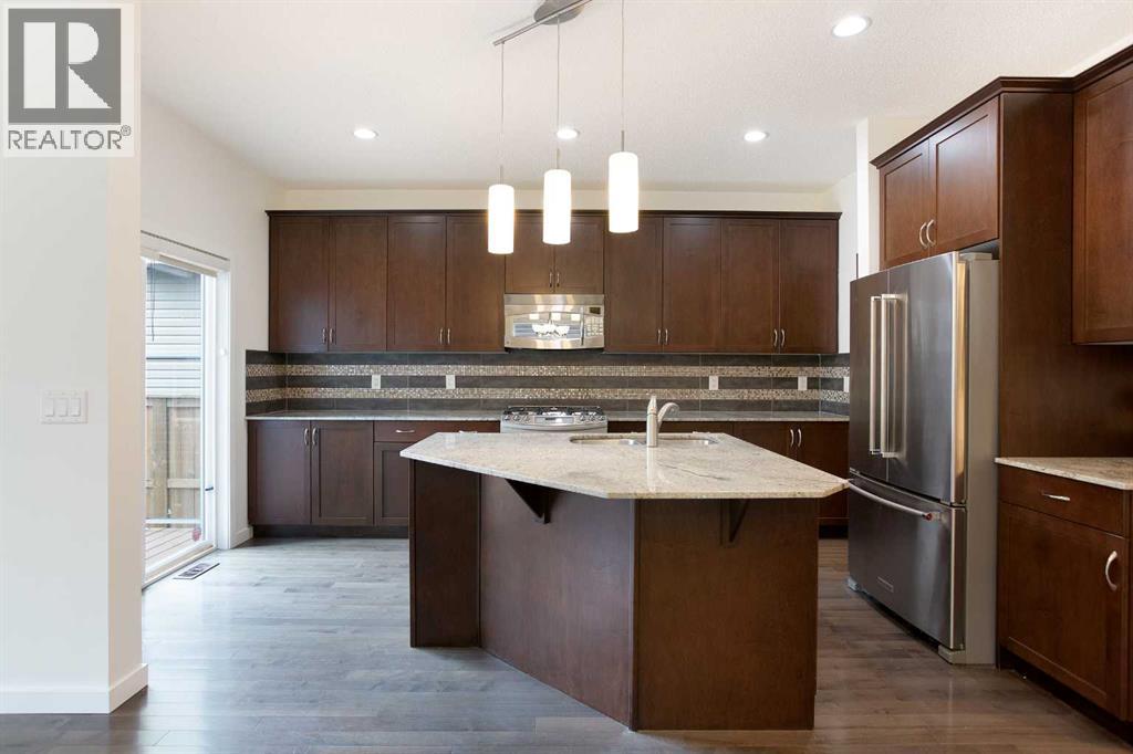 9 Cougar Ridge Rise Sw, Calgary, Alberta  T3H 0S7 - Photo 9 - A2249270