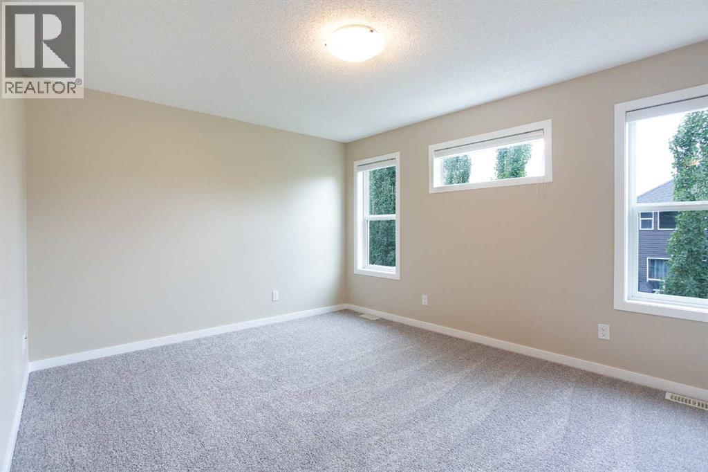 9 Cougar Ridge Rise Sw, Calgary, Alberta  T3H 0S7 - Photo 26 - A2249270