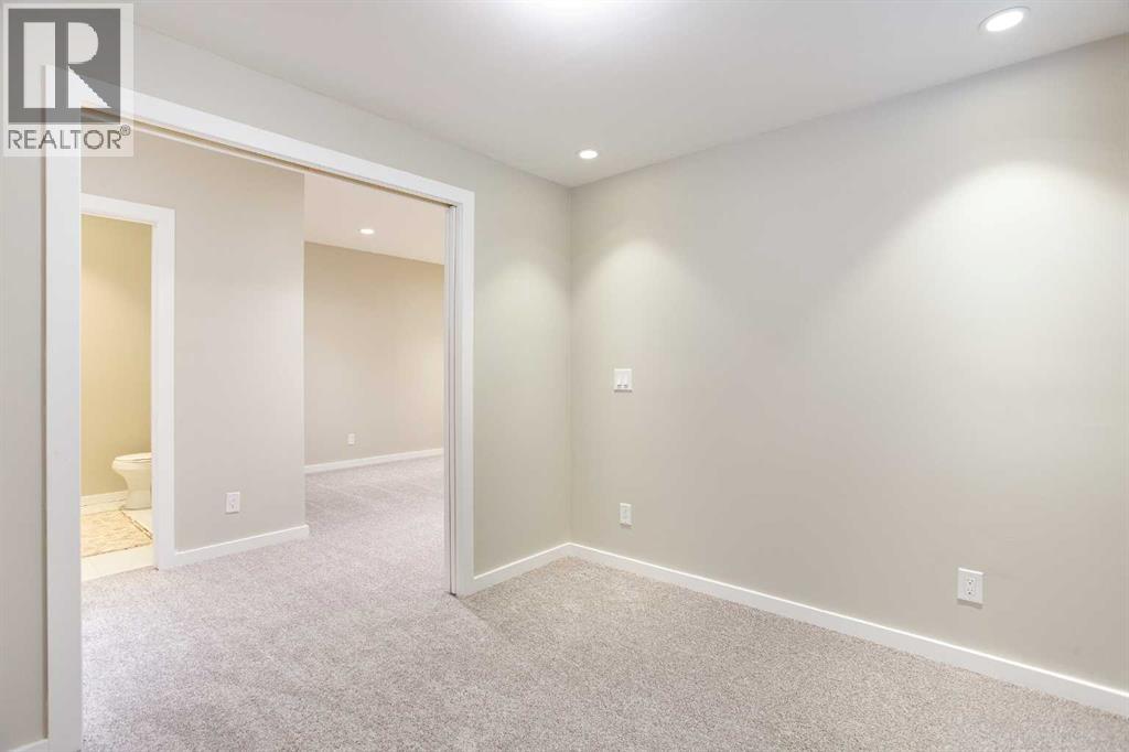 9 Cougar Ridge Rise Sw, Calgary, Alberta  T3H 0S7 - Photo 32 - A2249270