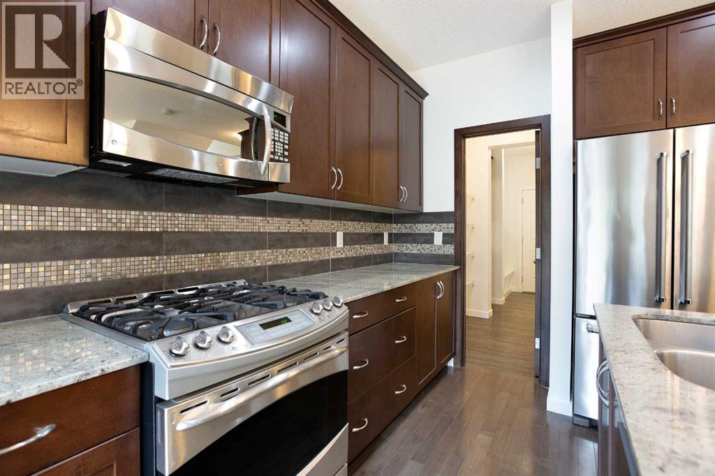 9 Cougar Ridge Rise Sw, Calgary, Alberta  T3H 0S7 - Photo 11 - A2249270