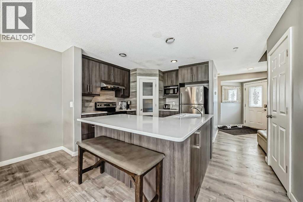 146 Saratoga Close Ne, Calgary, Alberta  T1Y 7A1 - Photo 5 - A2248949