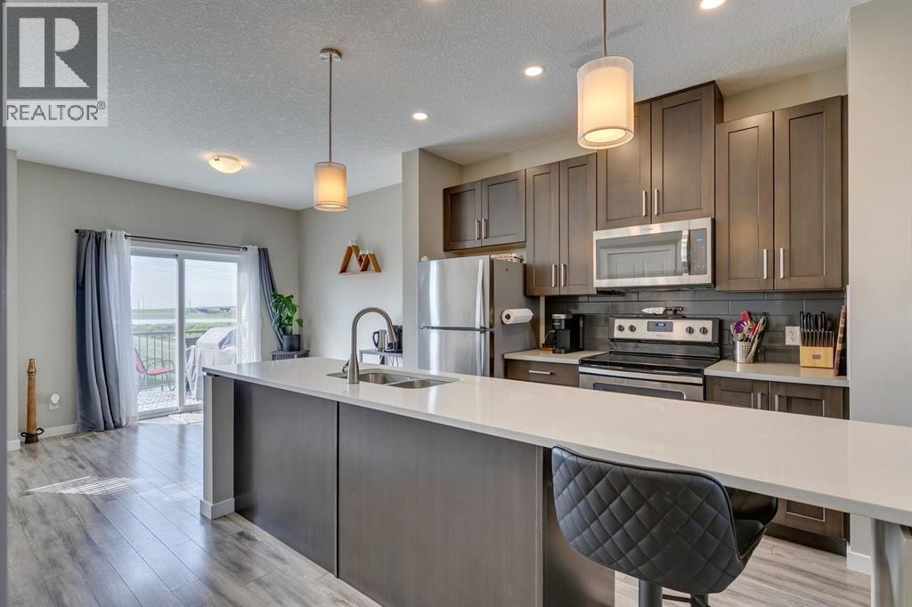 126 Copperstone Villas Se, Calgary, Alberta  T2Z 5E3 - Photo 4 - A2260615