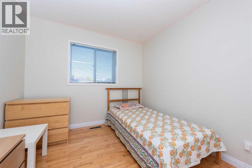 49 Rocky Ridge Heath Nw, Calgary, Alberta  T3G 4Z7 - Photo 18 - A2259925
