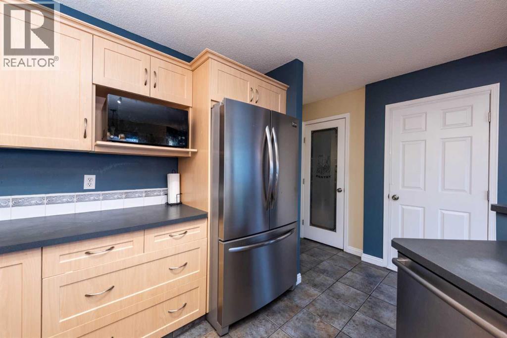 49 Rocky Ridge Heath Nw, Calgary, Alberta  T3G 4Z7 - Photo 7 - A2259925